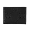 Gucci GG embossed bifold billfold 625559 in black calfskin with an open pattern for men
