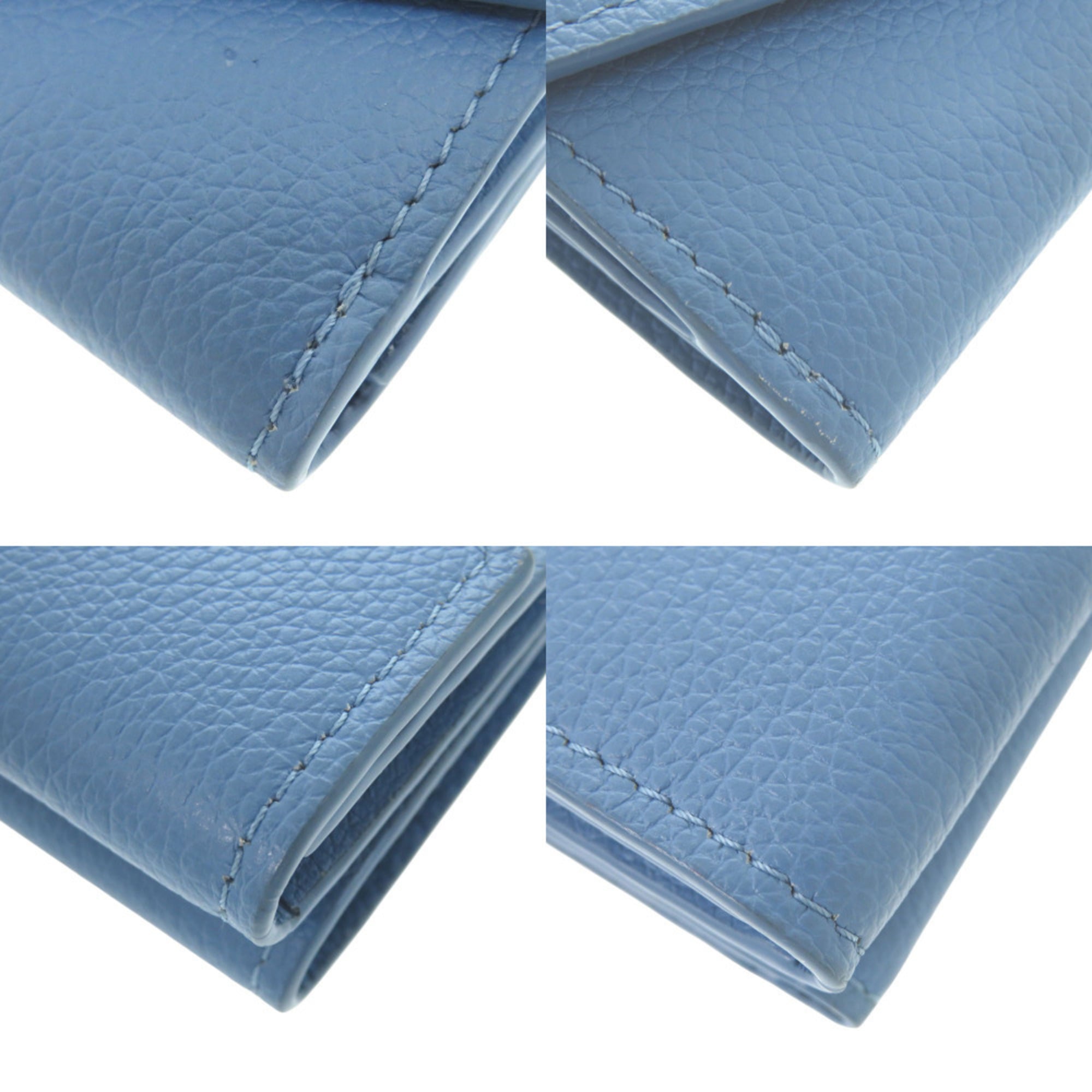 Excellent condition Louis Vuitton Portefeuille Rock Mini M67861, blue leather with silver hardware, LV tri-fold wallet 1036