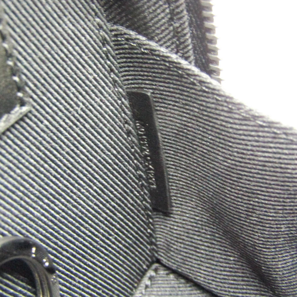 Louis Vuitton Leather Handbag Charm Silver,Black Pochette Soft Trunk Backpack M01392 — Like New