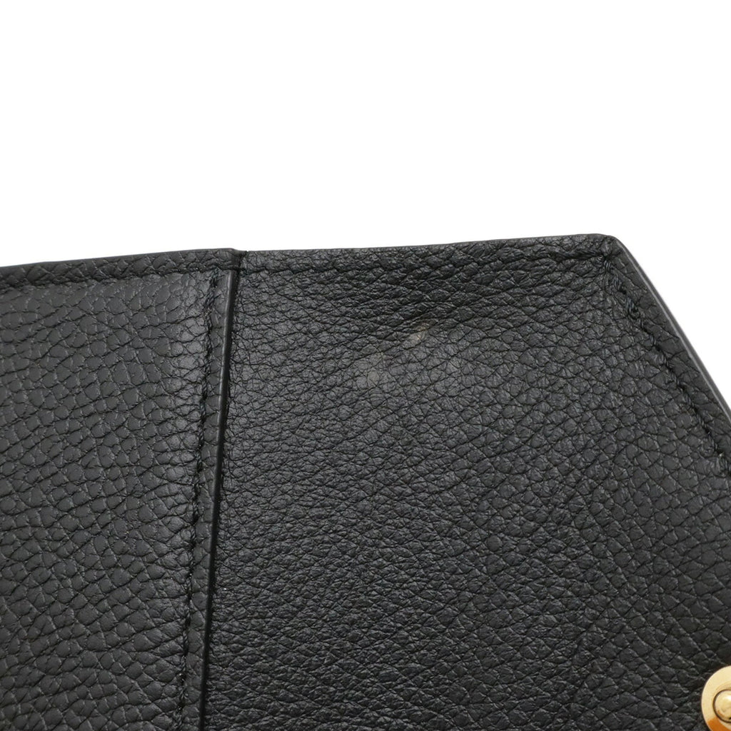 LOUIS VUITTON Monogram Empreinte Portefeuille Zoe Tri-fold Wallet in Black (Noir) M62935