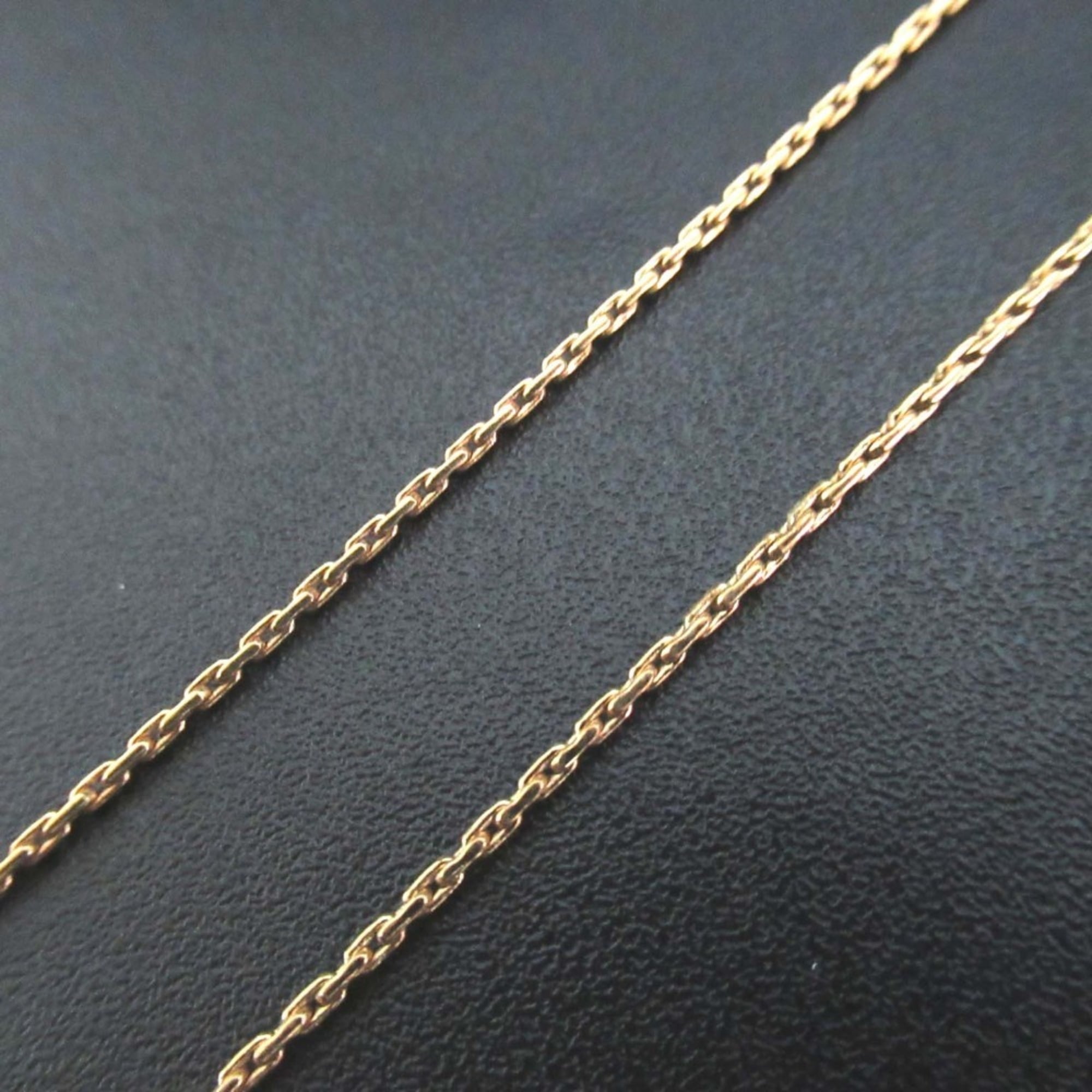 Vintage Christian Dior shell motif necklace pendant in gold for women.