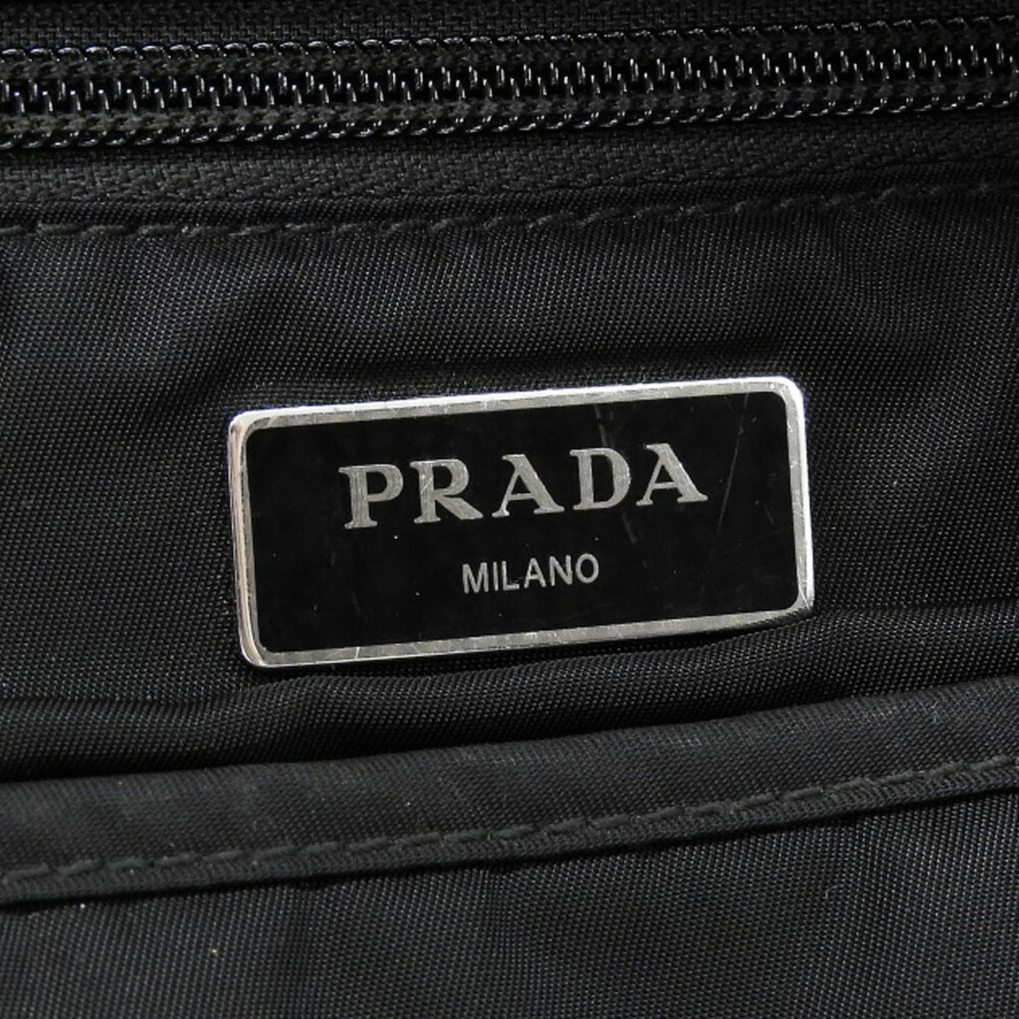 Prada 2VZ034 Backpack in Black Nylon with Triangular Plate