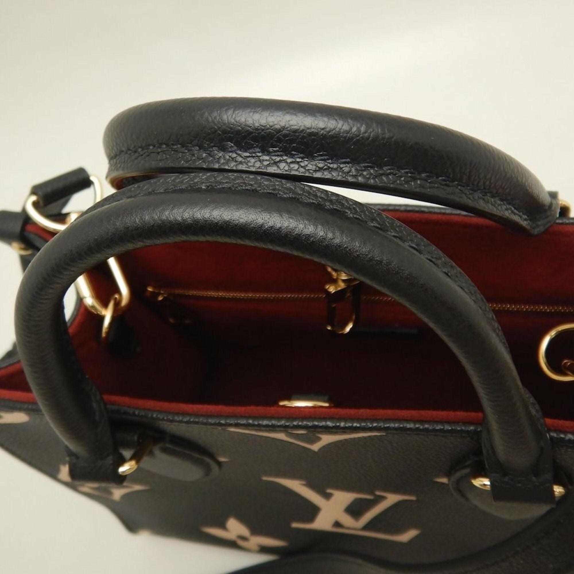 LOUIS VUITTON Louis Vuitton Bicolor Monogram OnTheGo PM M45659 Handbag Black Empreinte Beige Women's 253836 — Like New