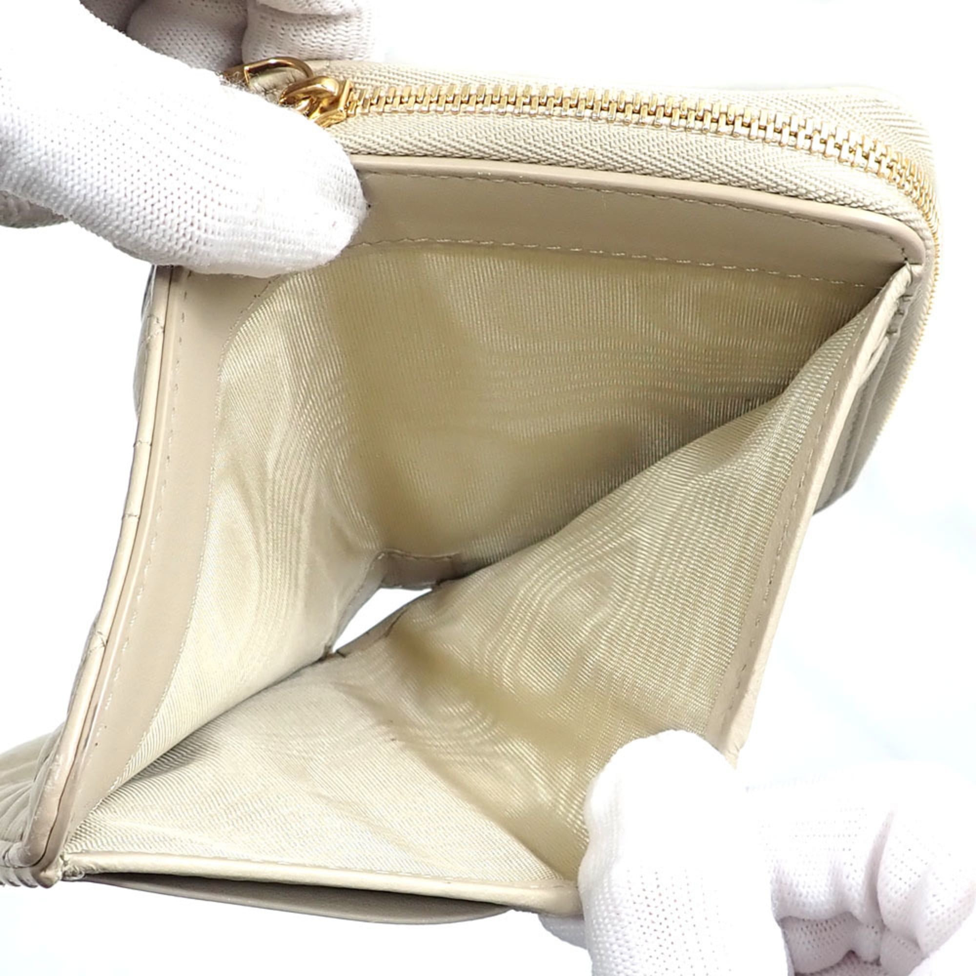 Christian Dior Caro Scarlett Women's Bifold Wallet in Beige Calfskin Leather (S5032UWHC-M116)