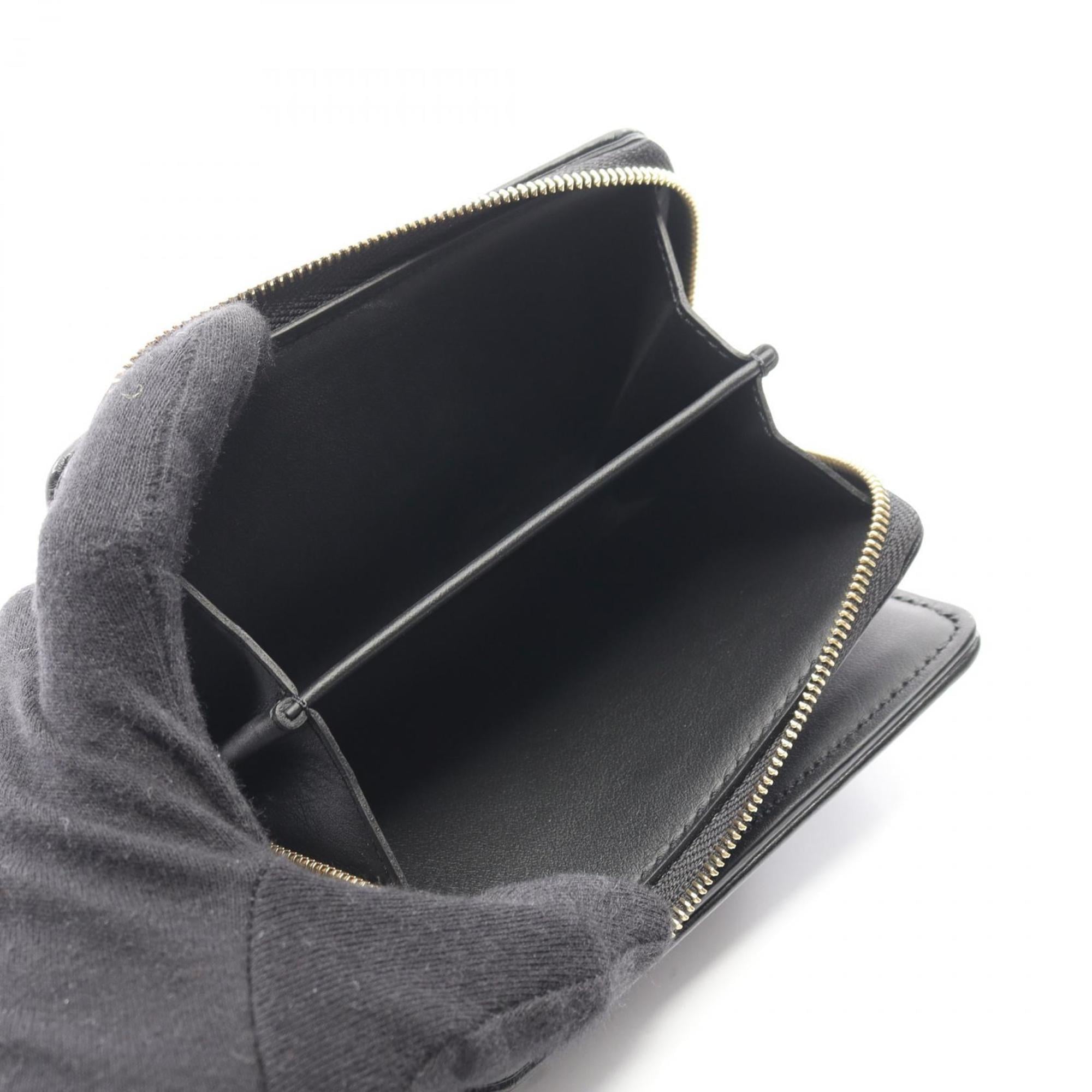 Louis Vuitton Portefeuille Lou Bifold Wallet, Leather, Monogram Embossed, Women's, Black, M81599