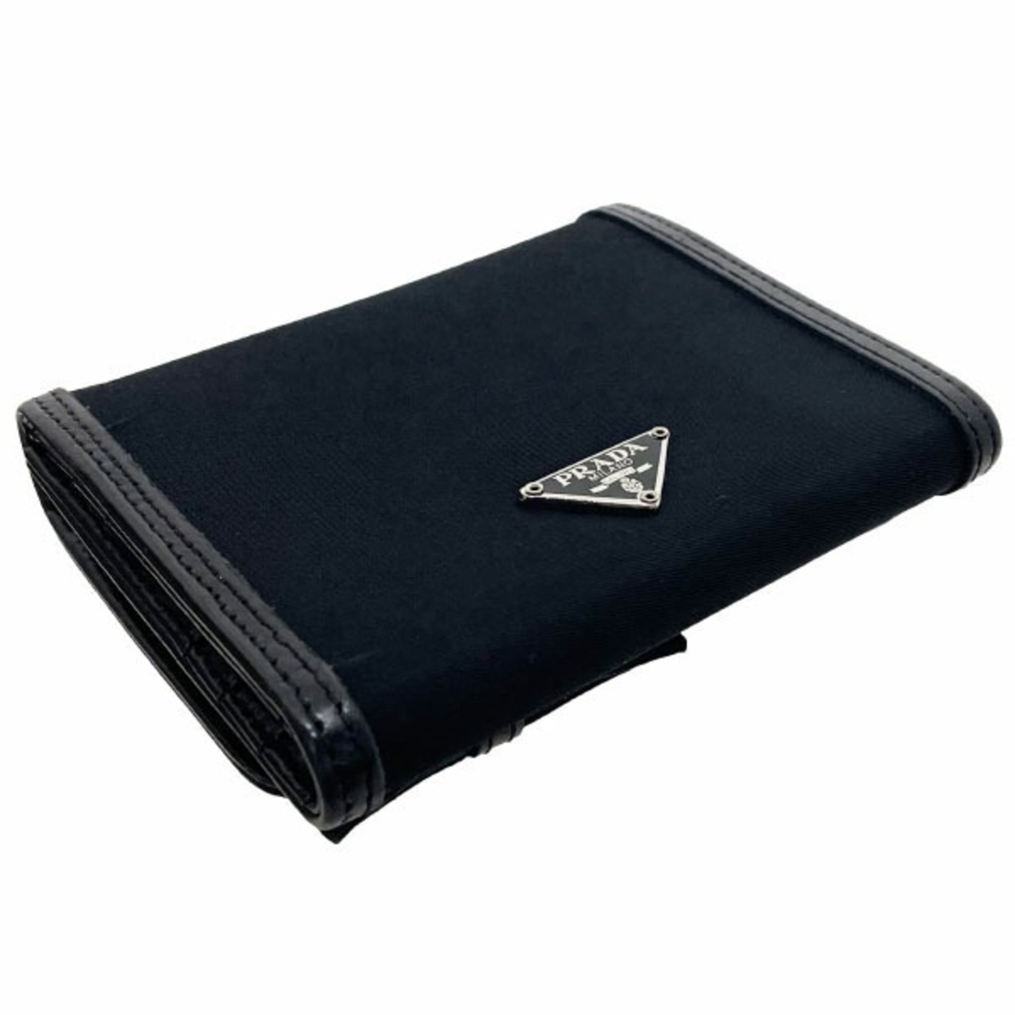 Prada Ribbon Triangle Trifold Wallet in Nylon and Leather, Black. Triangular Plate Compact Wallet, NERO MM-16119.