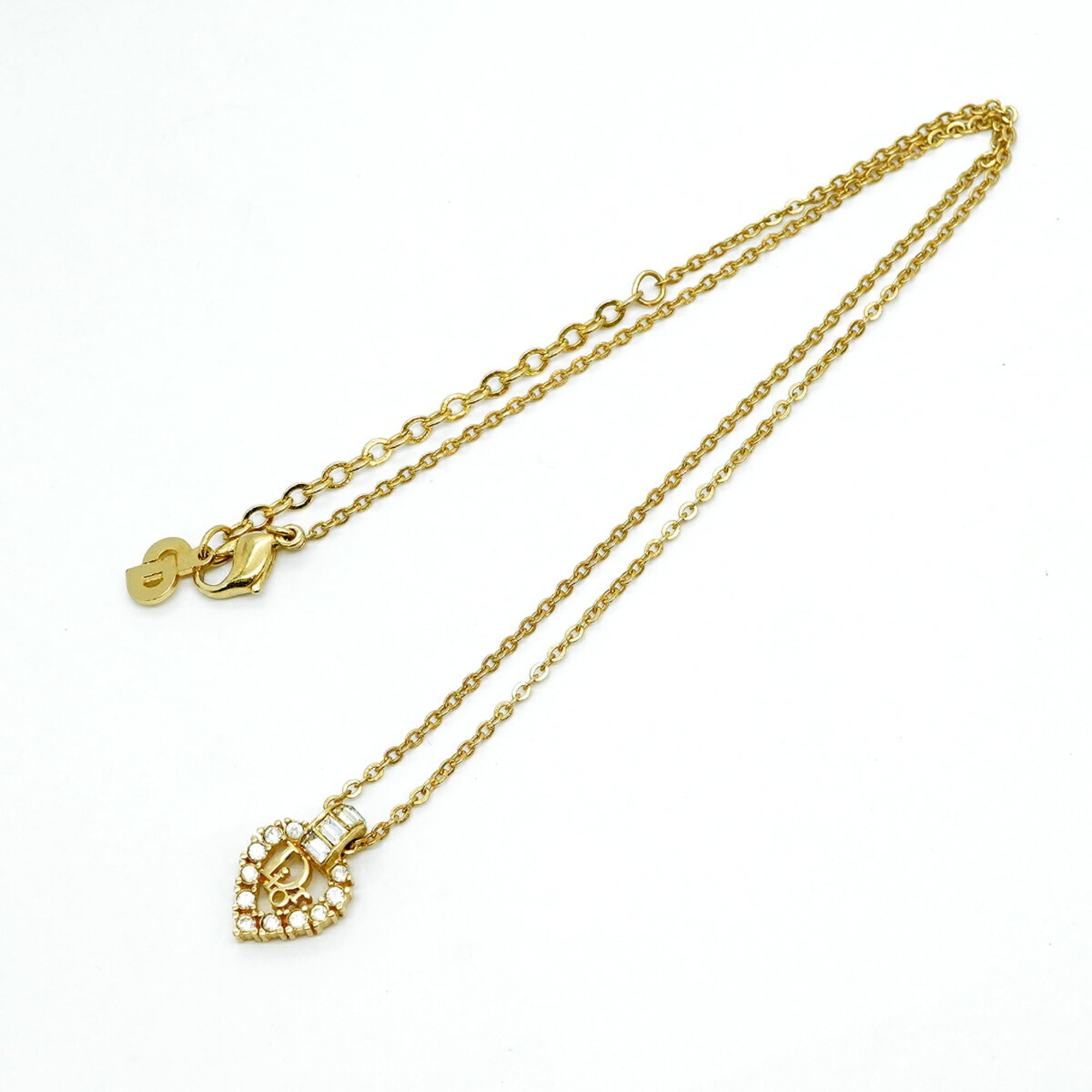 Christian Dior necklace with heart motif, gold plated rhinestones, for women.