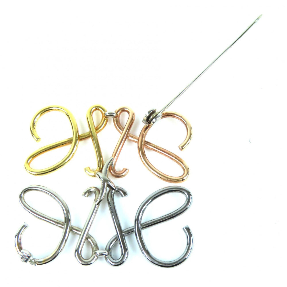 LOEWE Anagram Brooch in 4 Colors: Gold, Silver, Bronze. Comes with dust bag. Highly popular and recommended for women — Like New