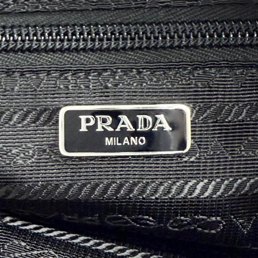 PRADA 1NS175 Vera Re-Nylon Mini Pouch Small Current Model Triangle Logo Plate Cosmetic Black Made in Italy Women's — Like New