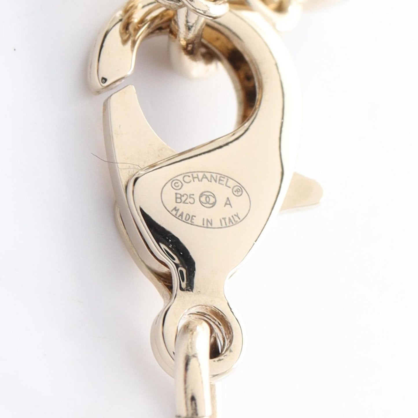 CHANEL Coco Mark Star Necklace with Gold-Plated Rhinestones, Available in Silver, Gold, and Clear.