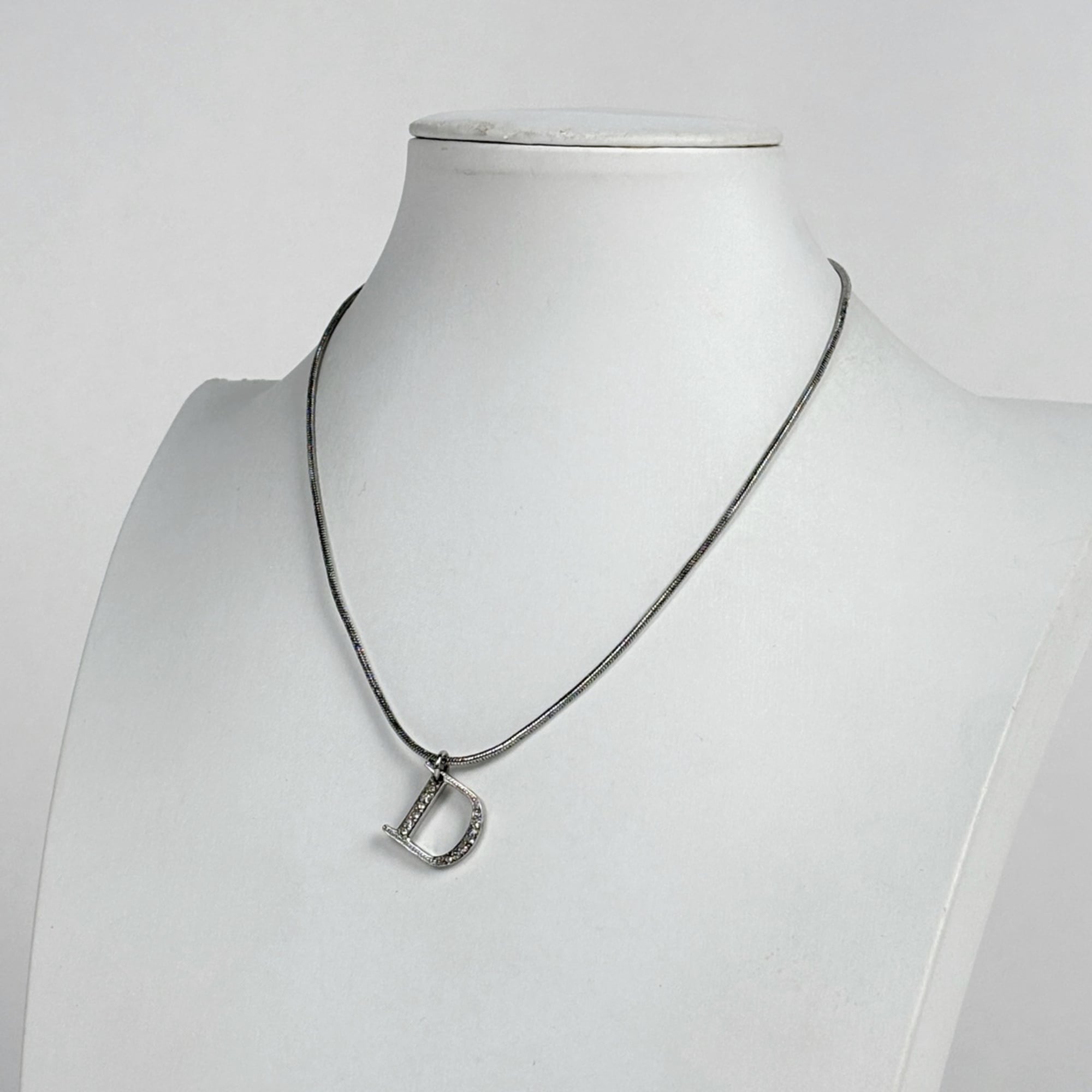 Christian Dior D logo rhinestone necklace, silver plated, for women.