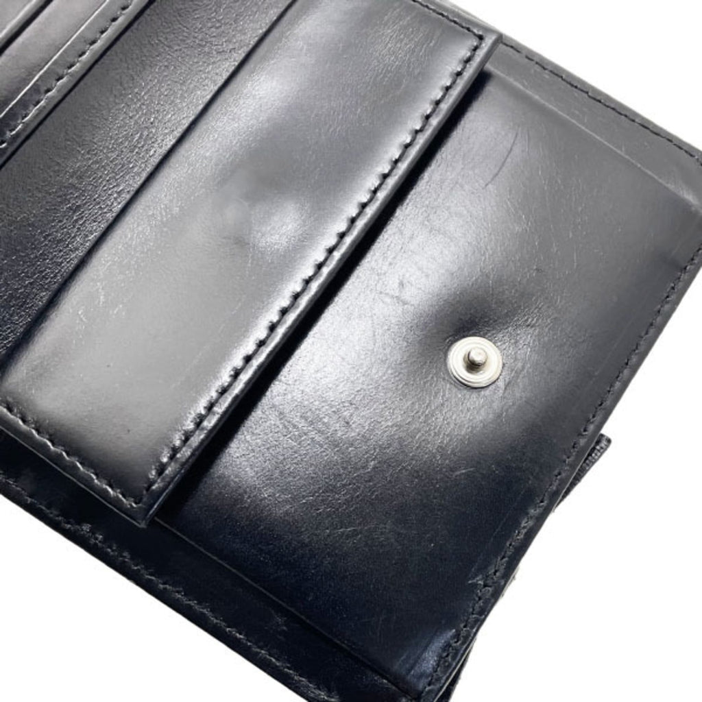 Prada Ribbon Triangle Trifold Wallet in Nylon and Leather, Black. Triangular Plate Compact Wallet, NERO MM-16119.