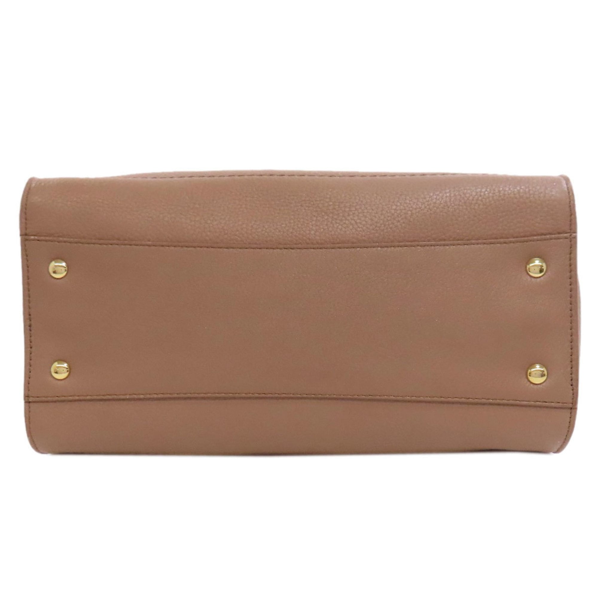 Salvatore Ferragamo Amy Gancini hardware leather tote bag for women.