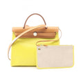 Hermes Hermès Airbag Zip PM handbag, canvas and leather, toile twill ash Berline, Vache Hunter, women's, yellow brown.