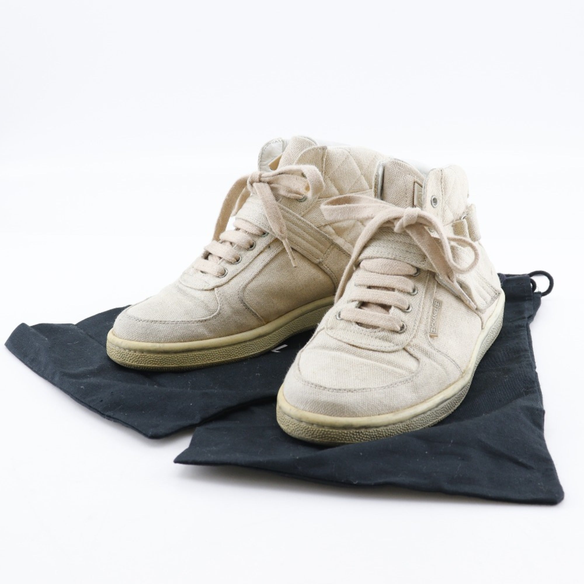 CHANEL High-top sneakers Matelasse