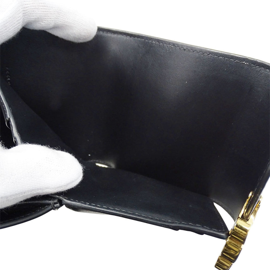 Celine Women's Triomphe Tri-fold Wallet in Shiny Calfskin. Compact, simple design.