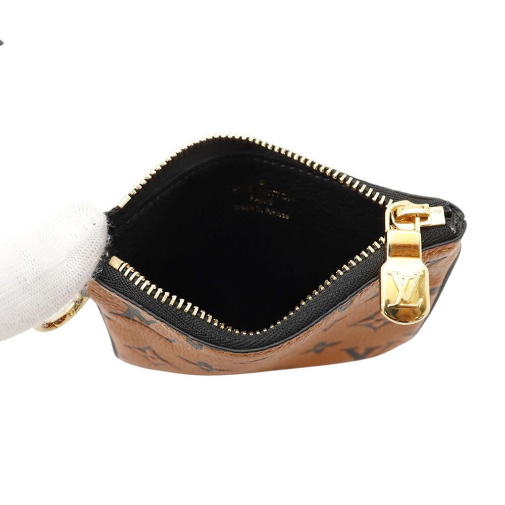 Louis Vuitton handbag pouch Monogram Empreinte Pochette Trio LV Crafty M69516 LOUIS VUITTON Black — Like New