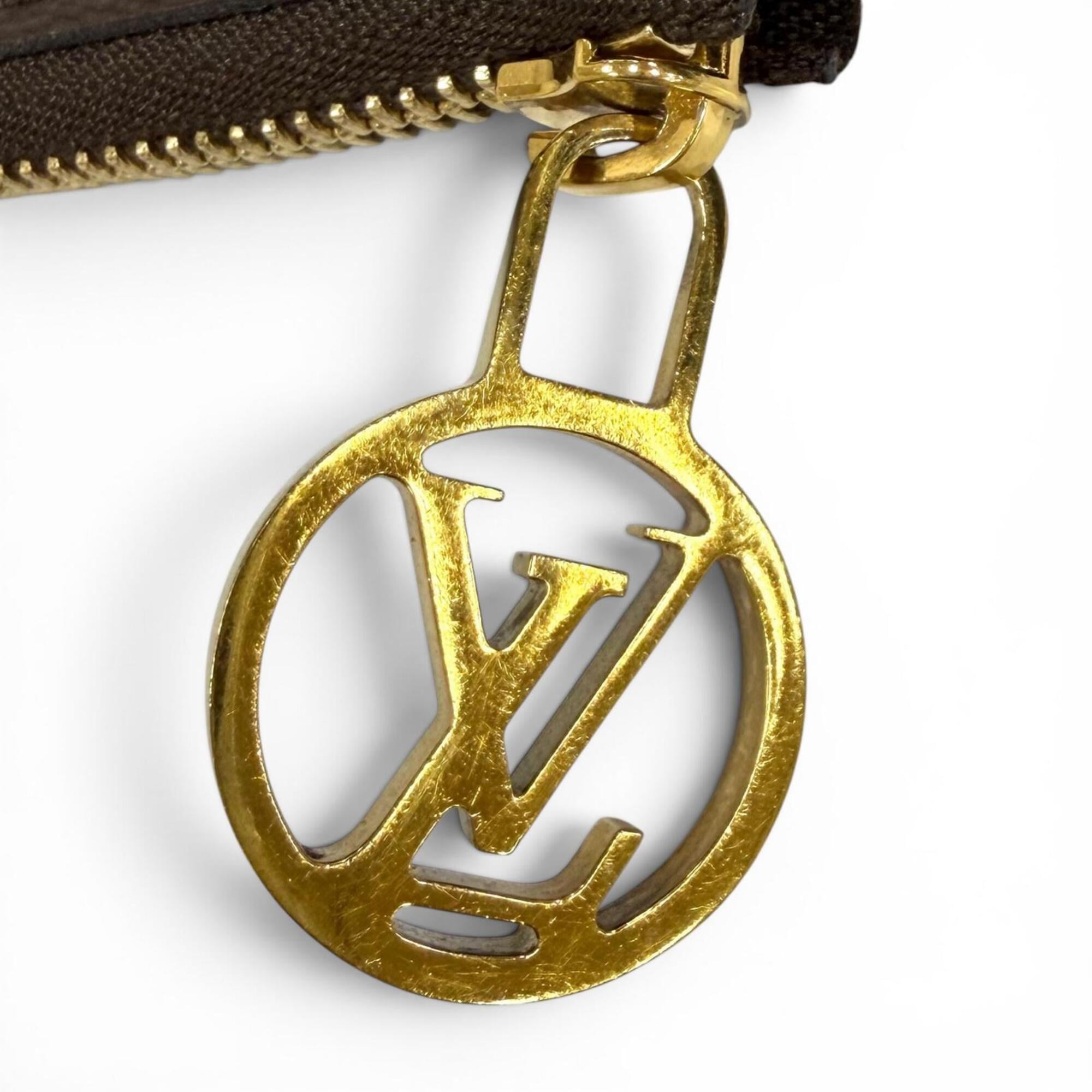 LOUIS VUITTON M68756 Monogram Giant Reverse Leather Pochette Trio Brown Made in France Women's with Dust Bag — Like New