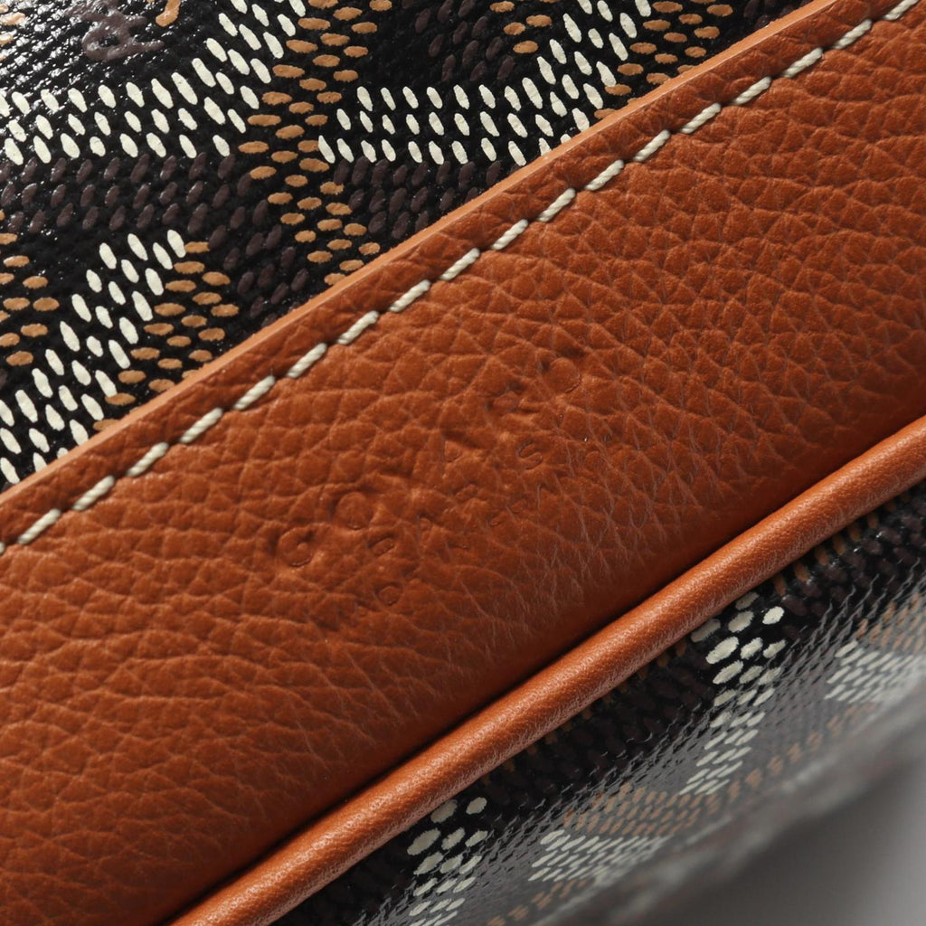 Goyard Petit Flo shoulder bag in coated canvas and leather. Available black, brown, multicolor.