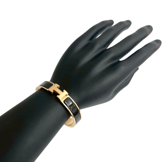 HERMES Click H Bracelet/Bangle Accessory for Women, Gold/Black, 28150