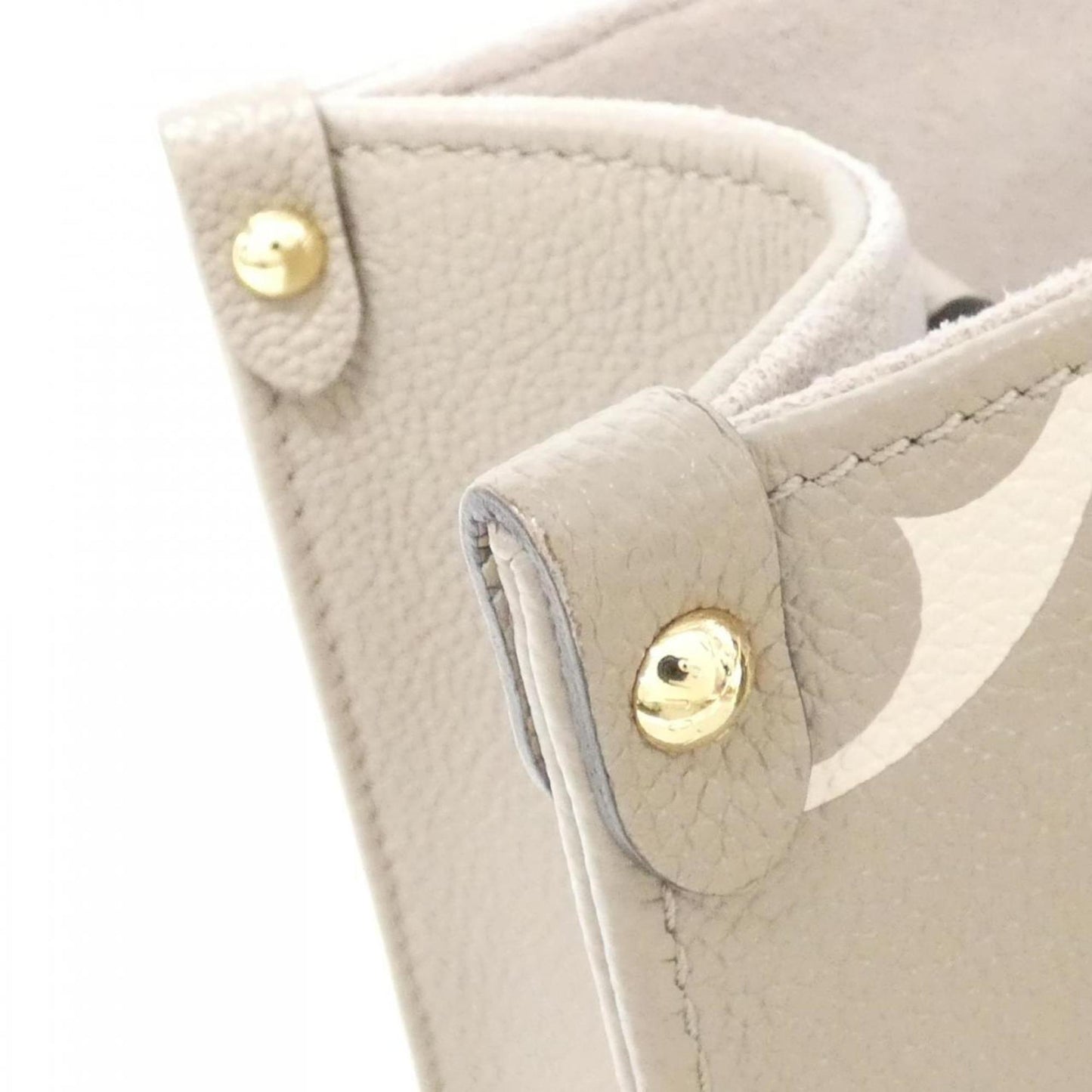 Louis Vuitton Two-Tone Monogram Empreinte On-the-Go PM M45779 Handbag