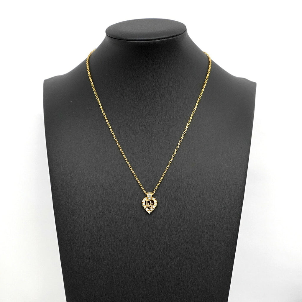 Christian Dior necklace with heart motif, gold plated rhinestones, for women.