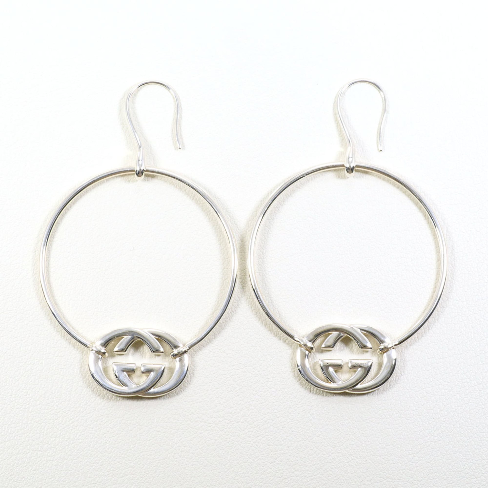 Gucci sterling silver 925 earrings with an interlocking G design. Total weight: approximately 10.6g. Like new — Like New
