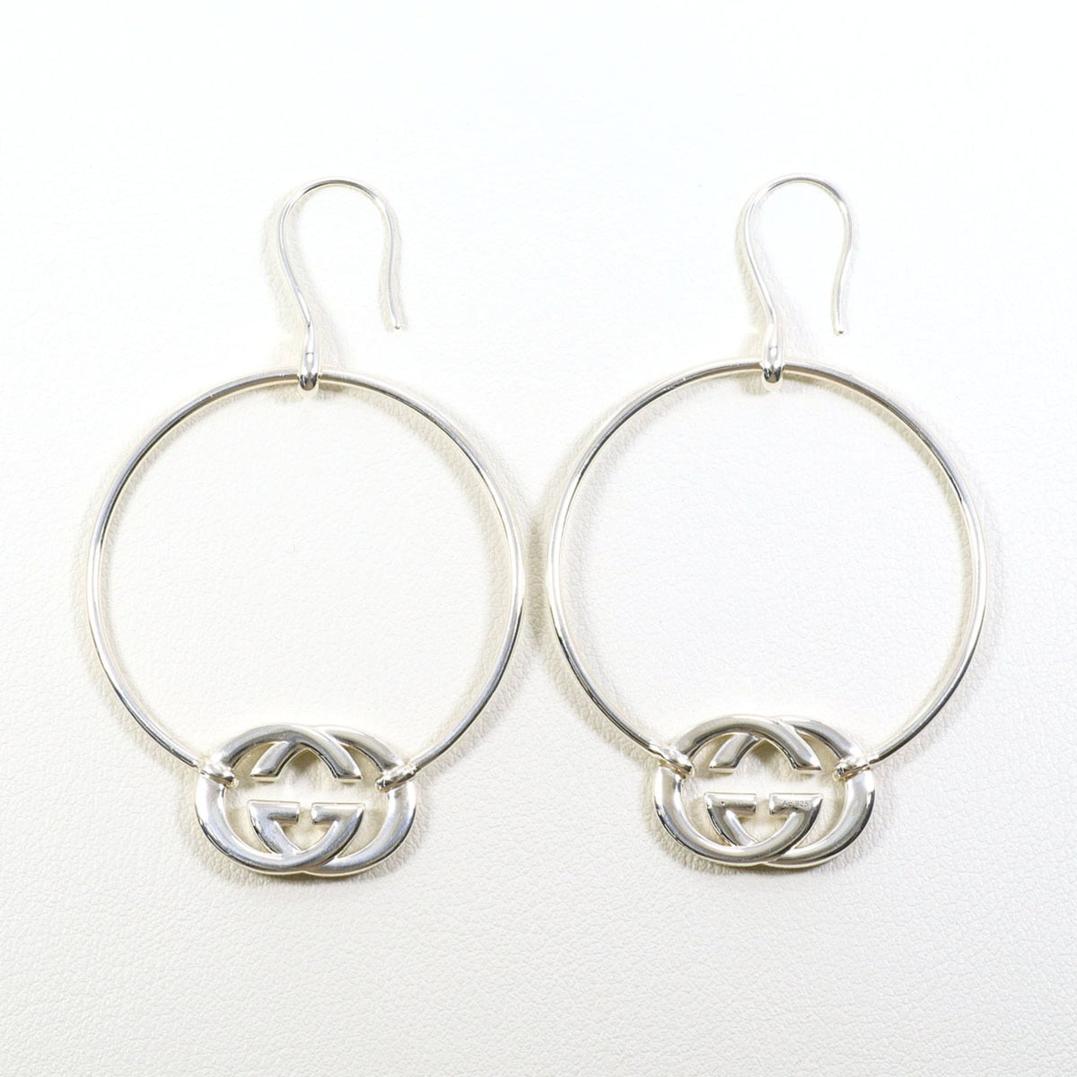 Gucci sterling silver 925 earrings with an interlocking G design. Total weight: approximately 10.6g. Like new — Like New