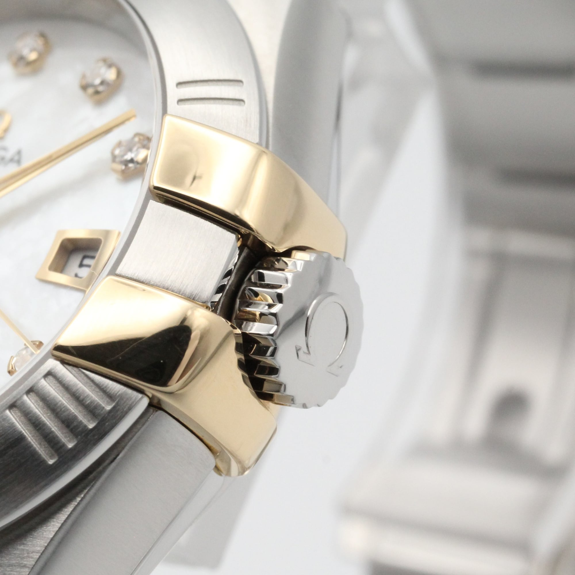 Omega Constellation watch, 18K yellow gold stainless steel, women's, white dial with mother-of-pearl case, model number 123.20.31.20.55.004 — Very Good