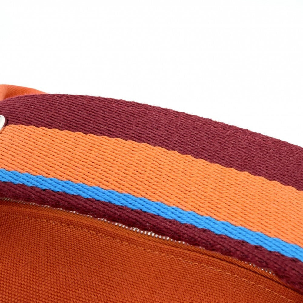 Hermes handbag for women, Bride à Black H Pavillon PM pouch, cotton, orange, silver hardware — Like New