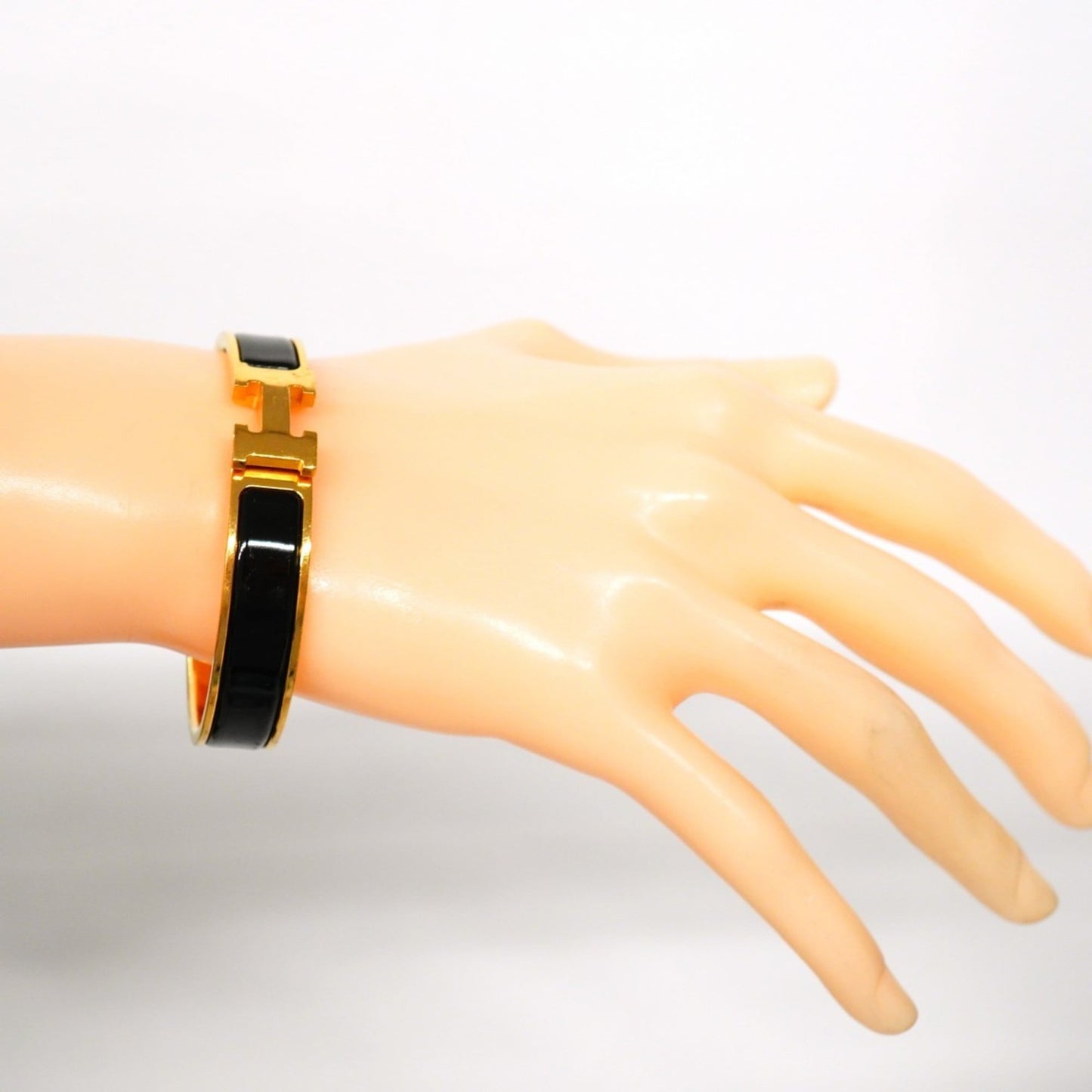 Hermes Click-Clack PM Bangle in GP-plated Gold and Black for Women