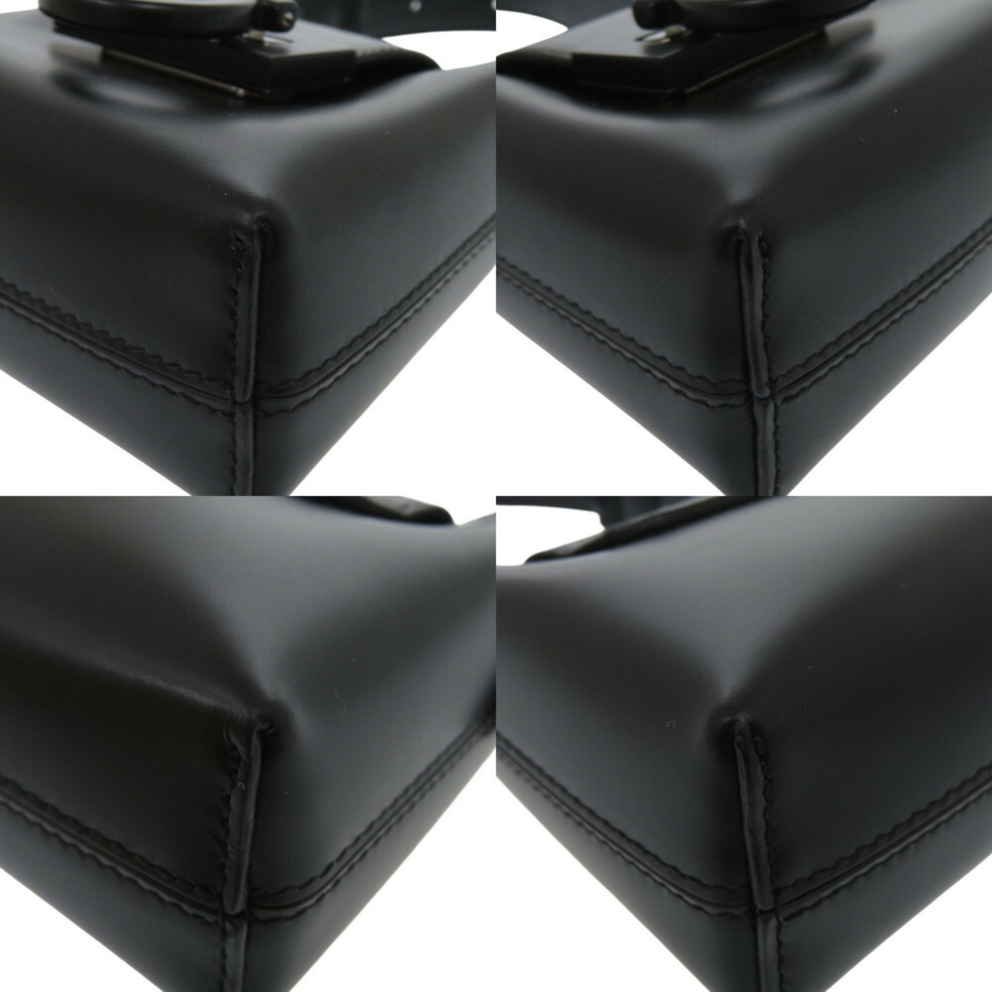 Like new Salvatore Ferragamo Gancini Trifoglio leather black handbag, model 0903 — Like New