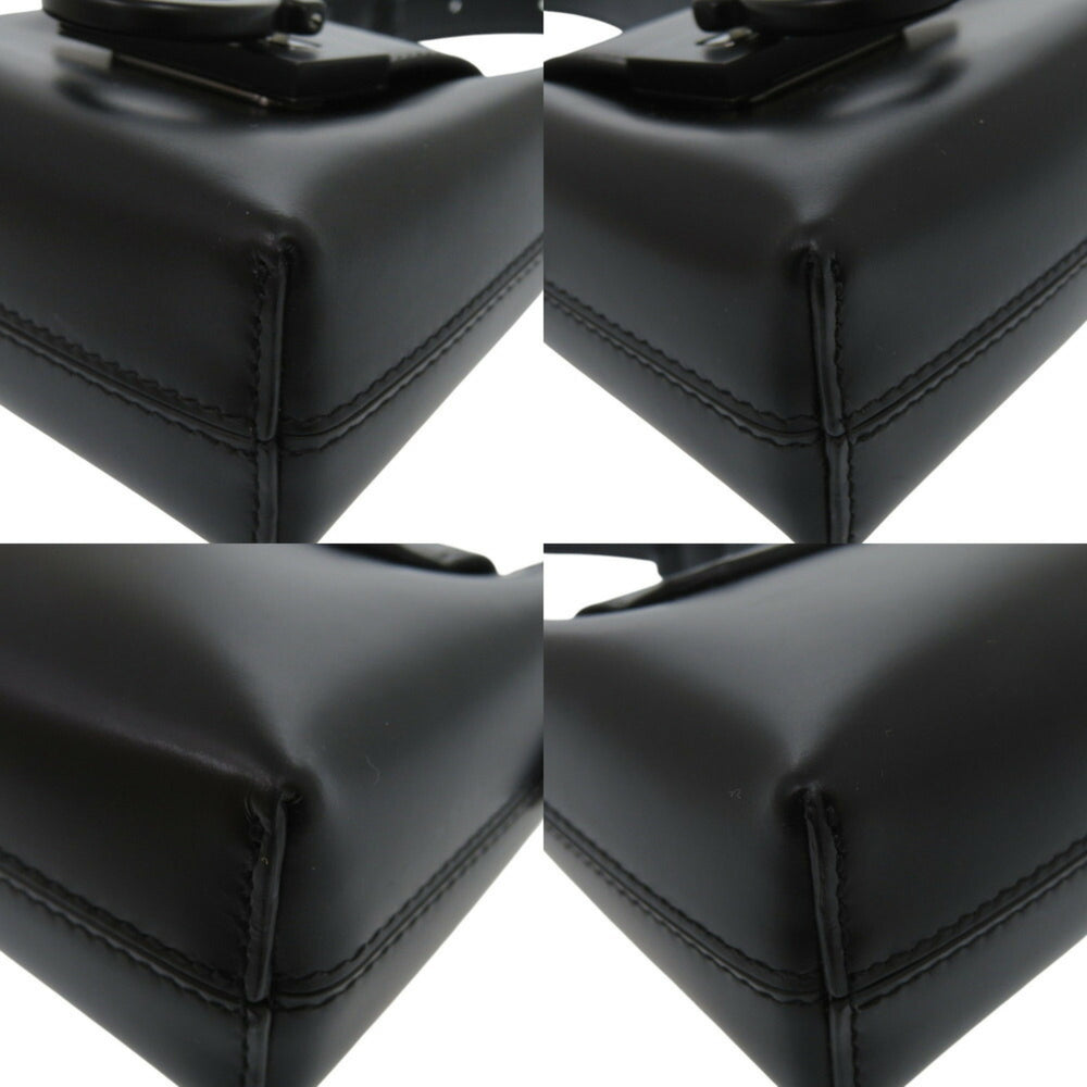Like new Salvatore Ferragamo Gancini Trifoglio leather black handbag, model 0903 — Like New