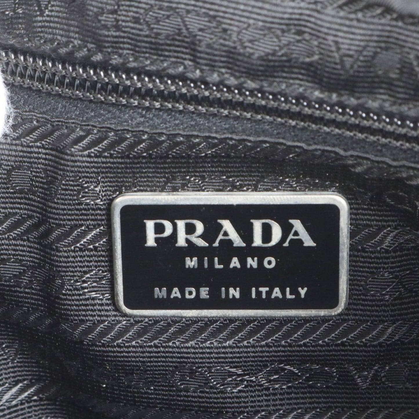 Prada Tessuto nylon triangle logo leather backpack for women