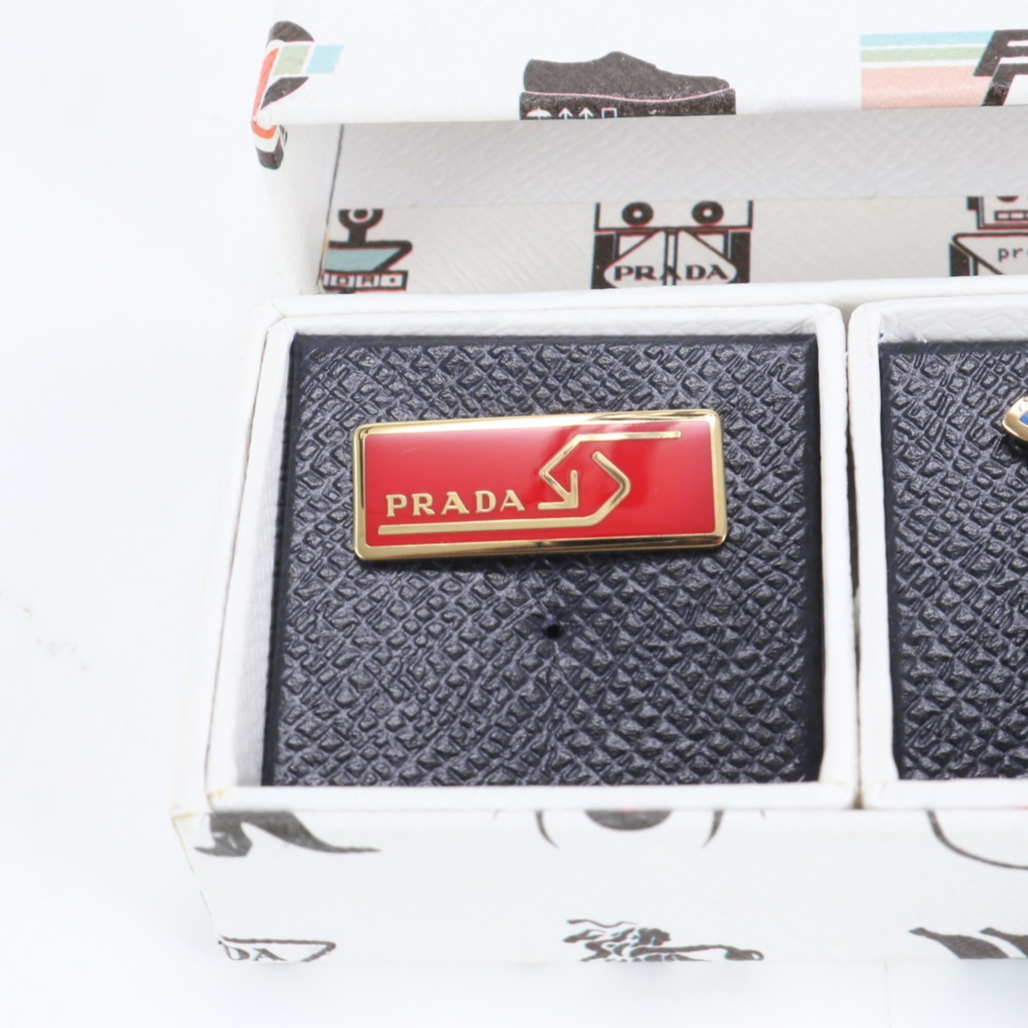 Prada pin badge brooch motif accessory for men