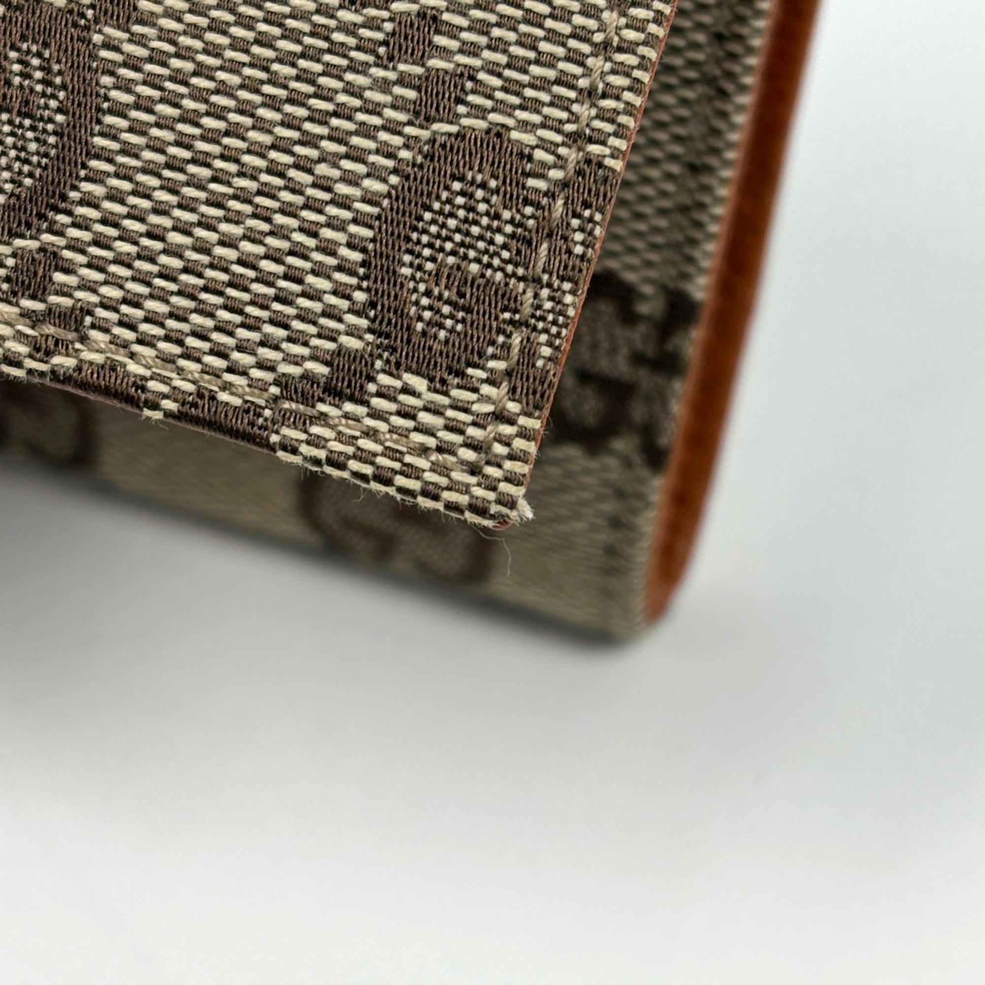 Gucci GG-patterned long wallet with bill compartment and coin purse in brown GG canvas (120967) for women