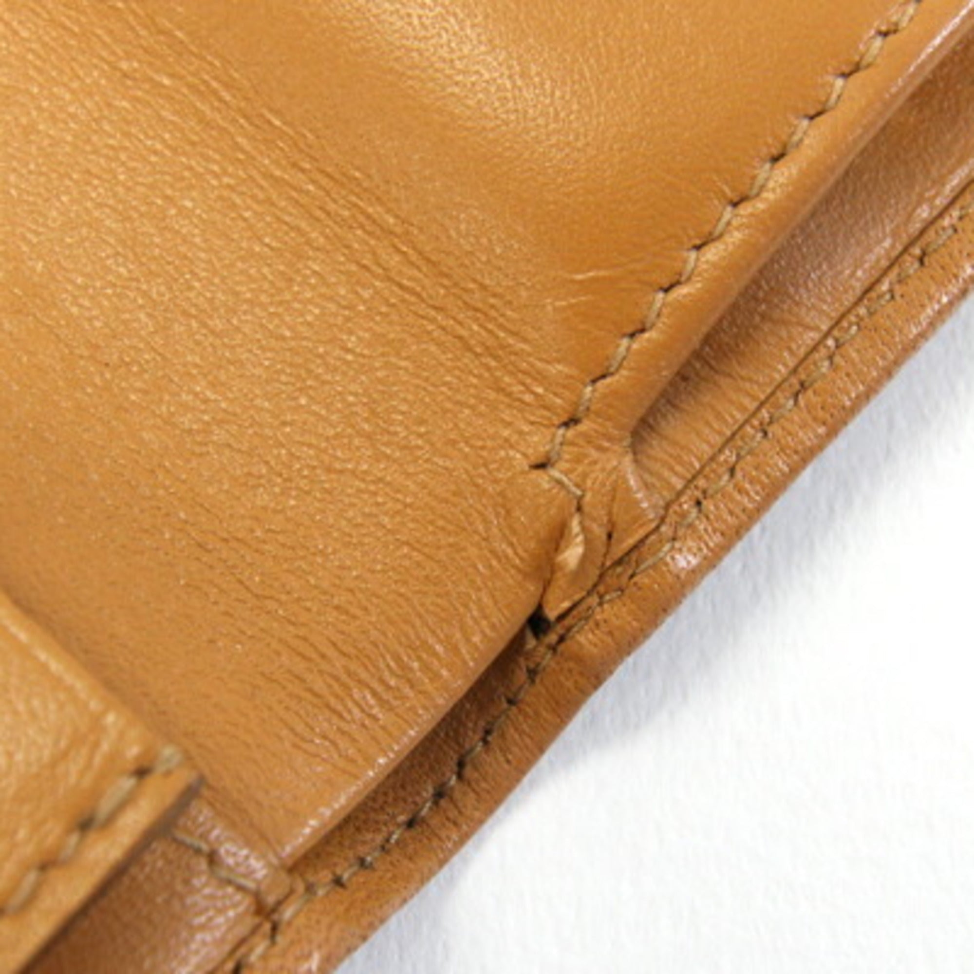 Celine bifold wallet in macadam, dark brown, beige, PVC, and leather. Compact wallet/mini wallet. For older women.