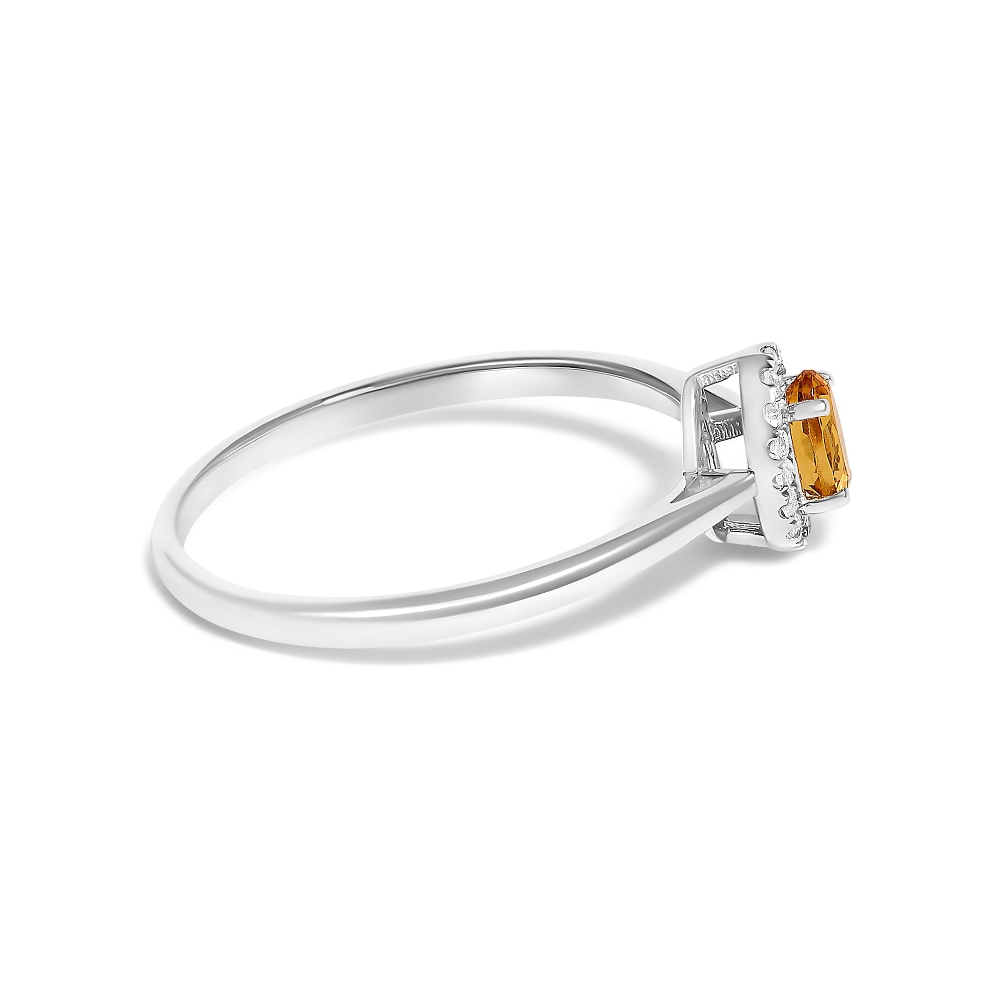 10K White Gold 5X3MM Oval Birthstone and Diamond Accent Halo Ring