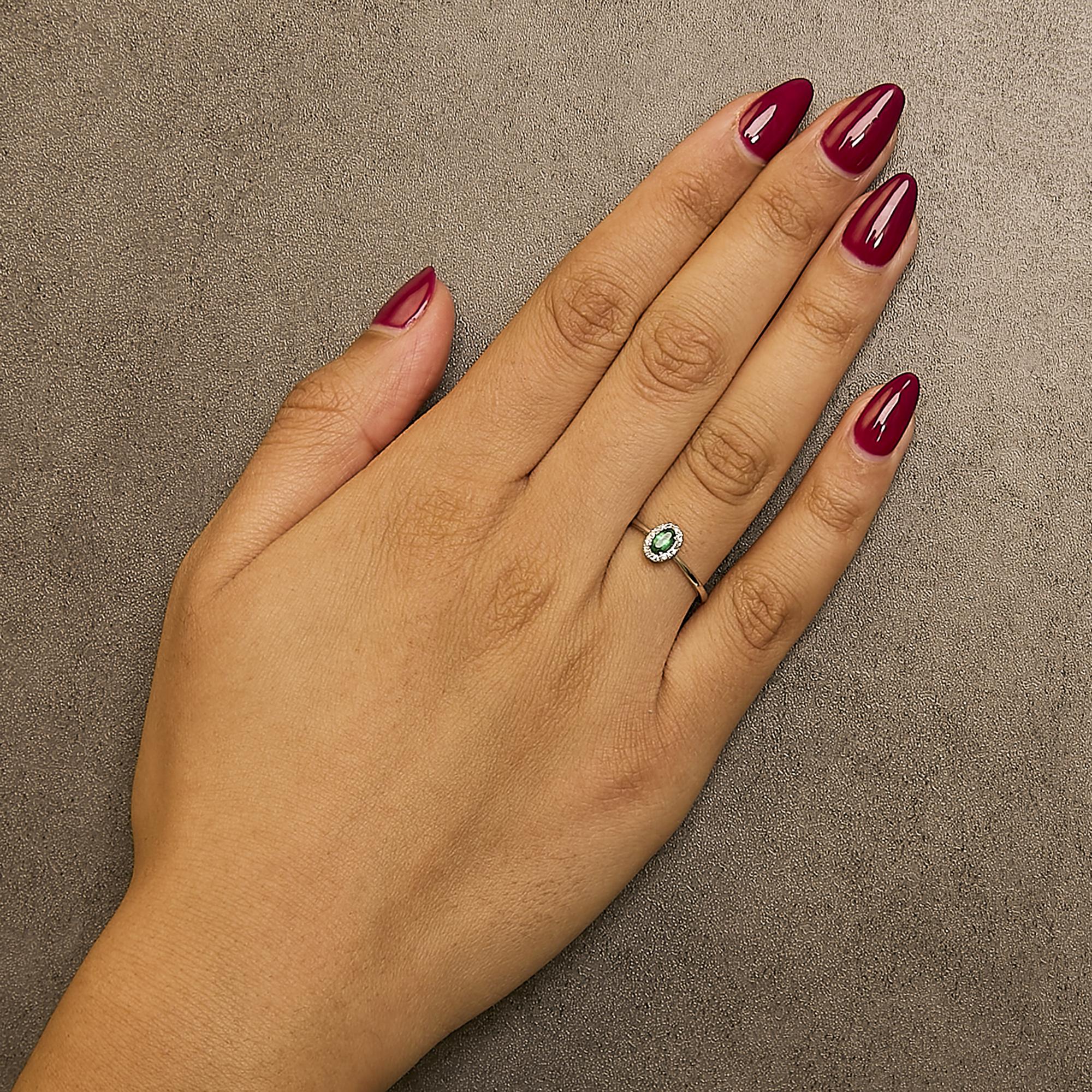 10K White Gold 5X3MM Oval Birthstone and Diamond Accent Halo Ring