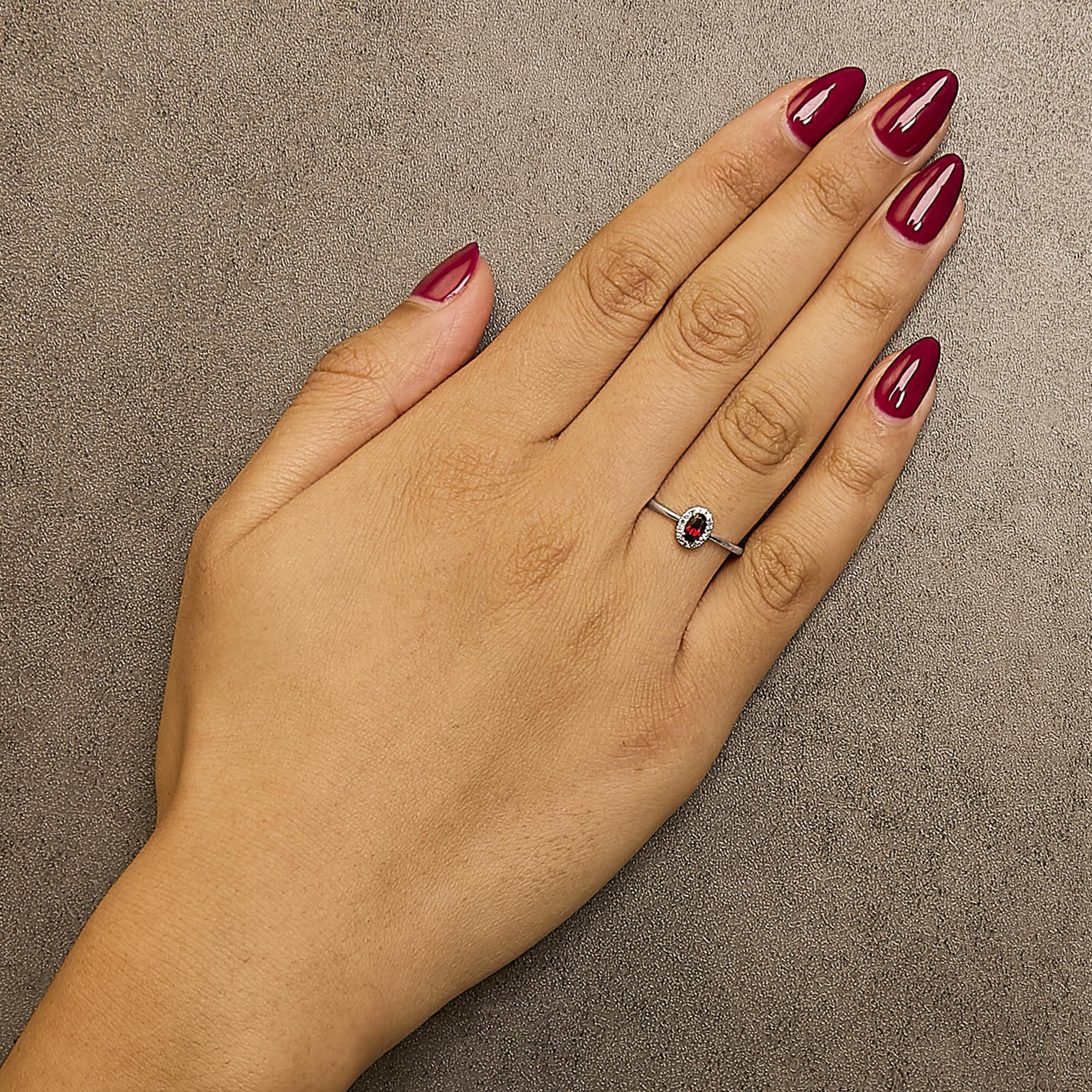 10K White Gold 5X3MM Oval Birthstone and Diamond Accent Halo Ring