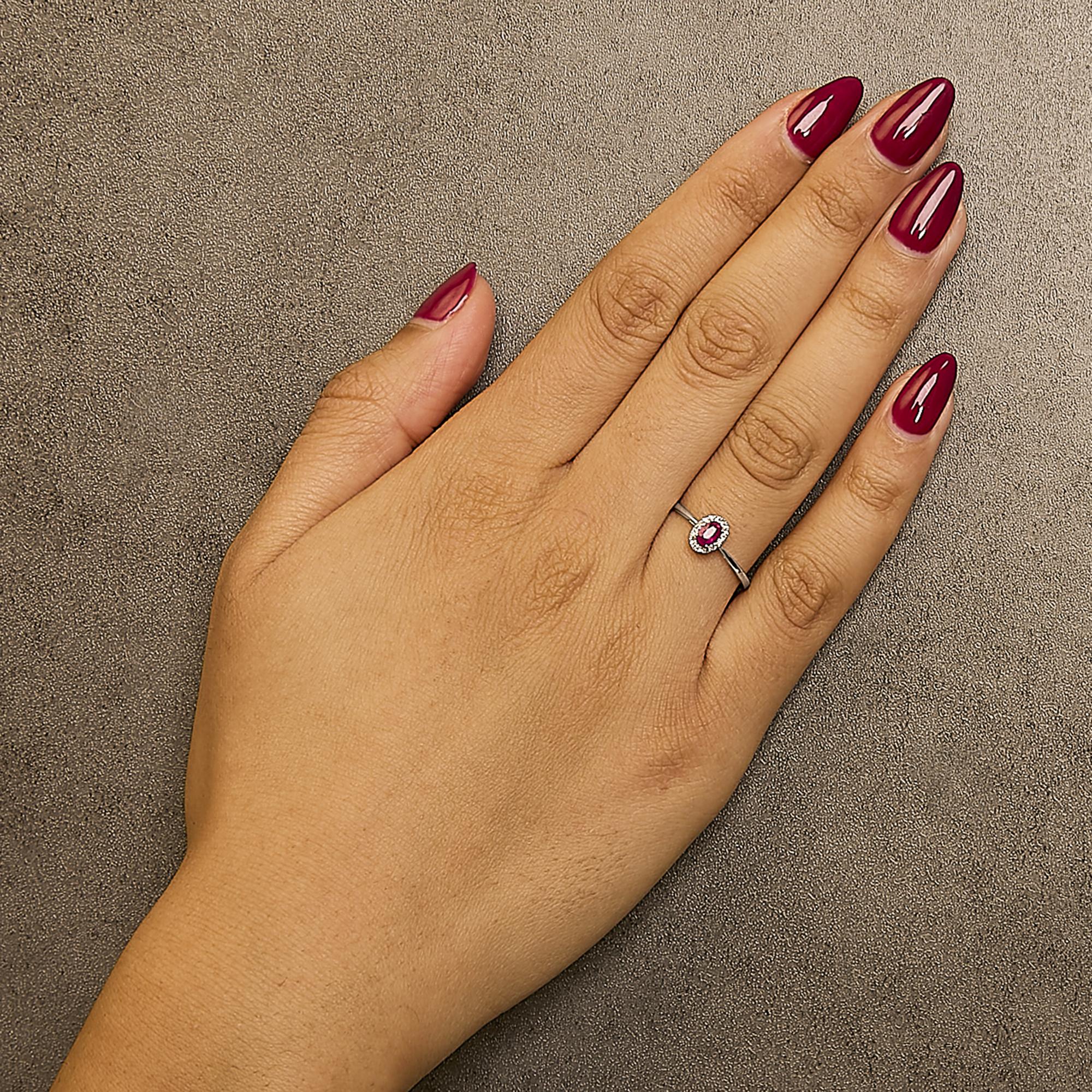 10K White Gold 5X3MM Oval Birthstone and Diamond Accent Halo Ring