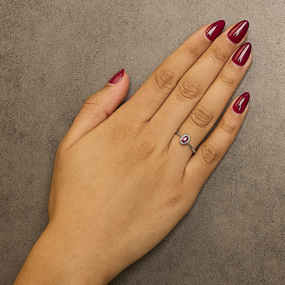 10K White Gold 5X3MM Oval Birthstone and Diamond Accent Halo Ring