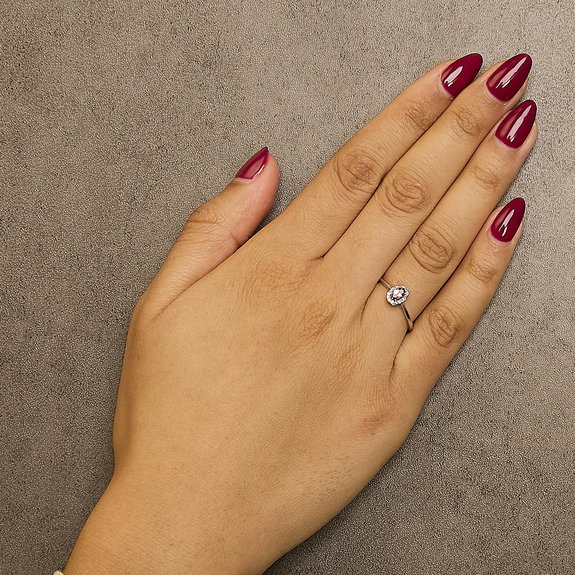 10K White Gold 5X3MM Oval Birthstone and Diamond Accent Halo Ring
