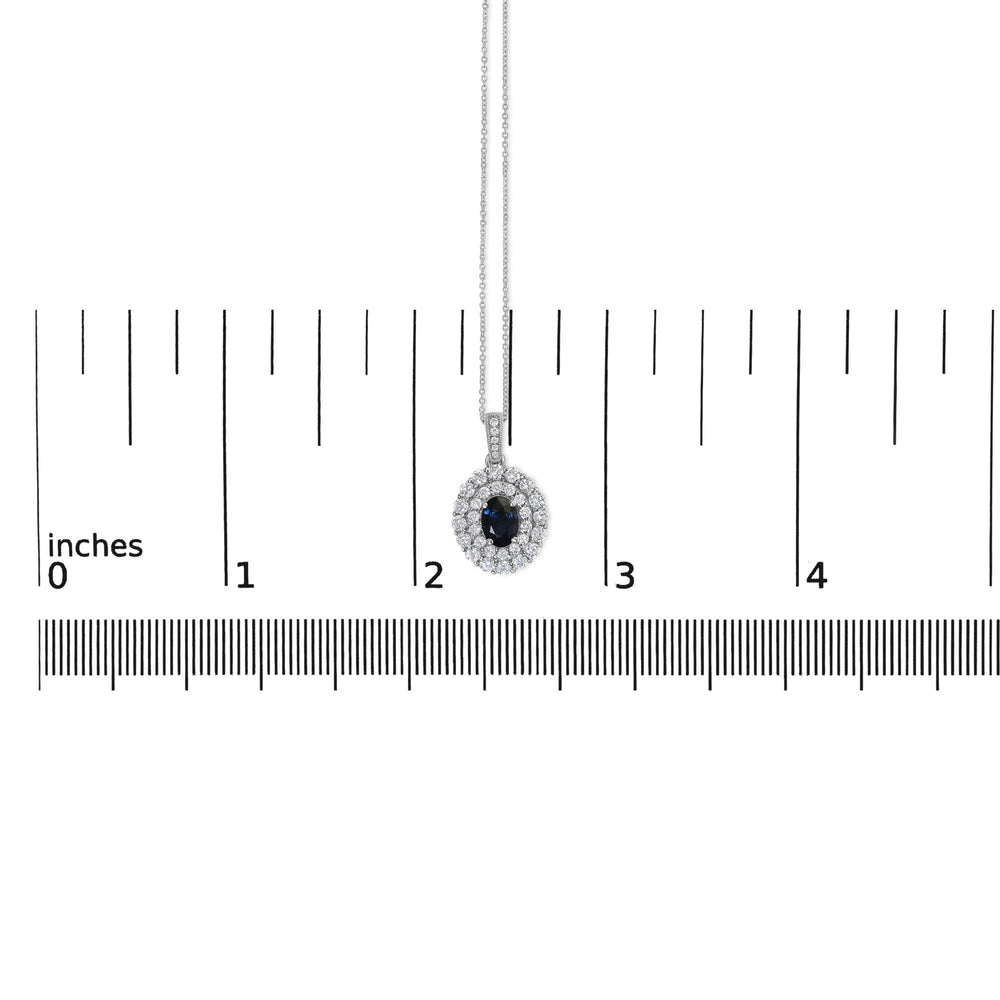 14K White Gold Oval Blue Sapphire and 3/4 Cttw Diamond Halo Pendant Necklace