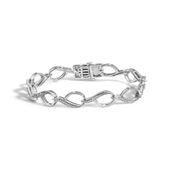 Sterling Silver 1/10 Cttw Diamond Accent Swirl Link Bracelet