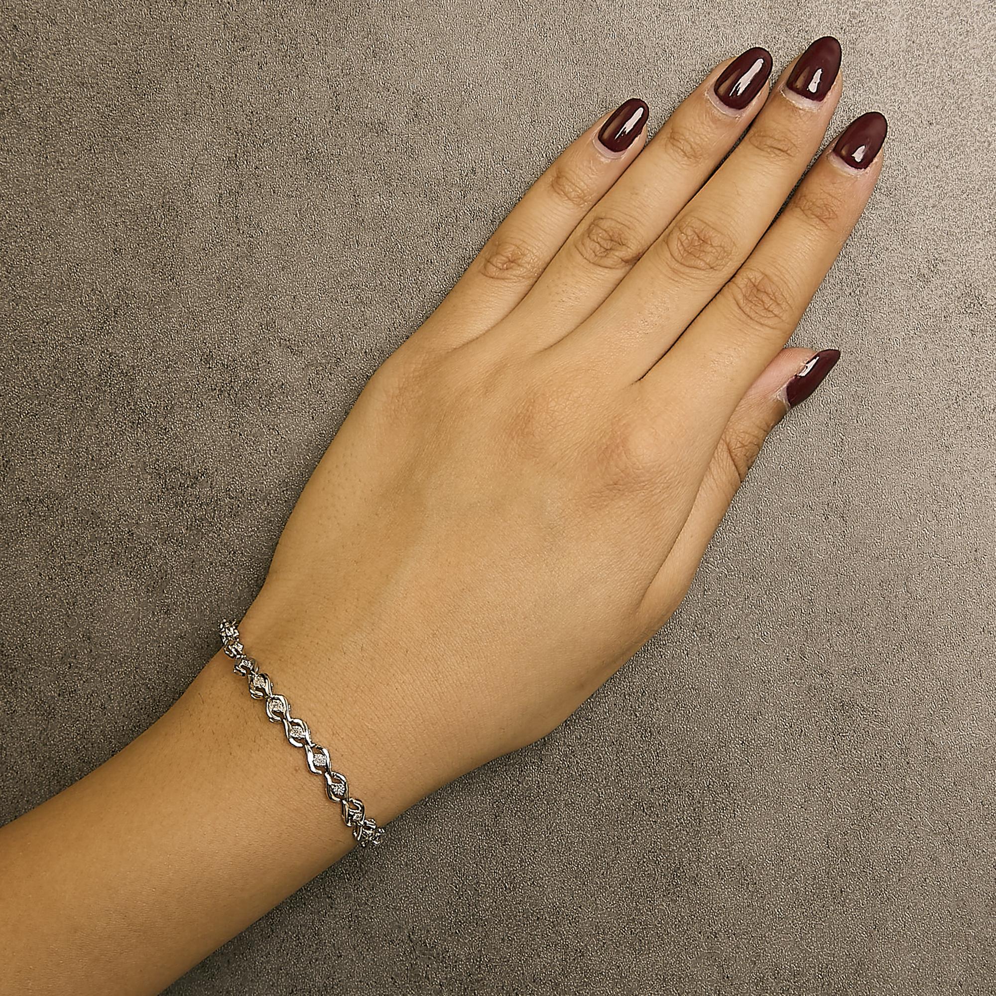 .925 Sterling Silver 1/10 Cttw Round-Cut Diamond Link Bracelet (I-J Color, I3 Promo Clarity) - 7.25"