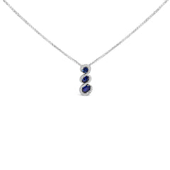 .925 Sterling Silver Created Blue and White Sapphire 3 Stone Swirl Pendant Necklace