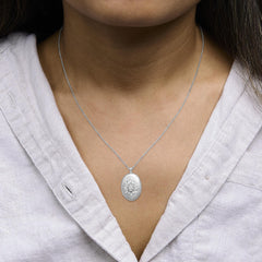 Sterling Silver 3/8 Cttw Diamond Puffed Oval Medallion Pendant Necklace