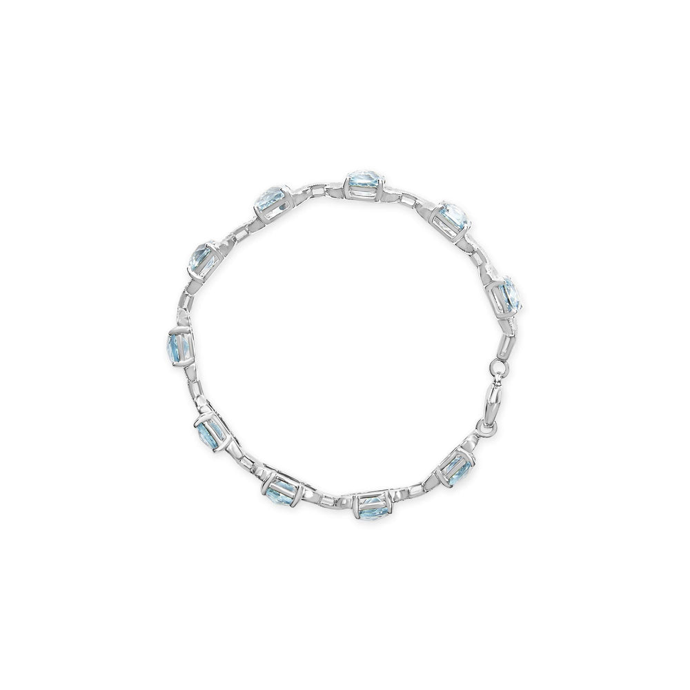 .925 Sterling Silver 7x7 mm Cushion Cut Blue Topaz and 1/20 cttw Round Cut Diamond Fashion Tennis Bracelet (I-J Color, I1-I2 Clarity) - 7"
