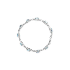 .925 Sterling Silver 7x7 mm Cushion Cut Blue Topaz and 1/20 cttw Round Cut Diamond Fashion Tennis Bracelet (I-J Color, I1-I2 Clarity) - 7"